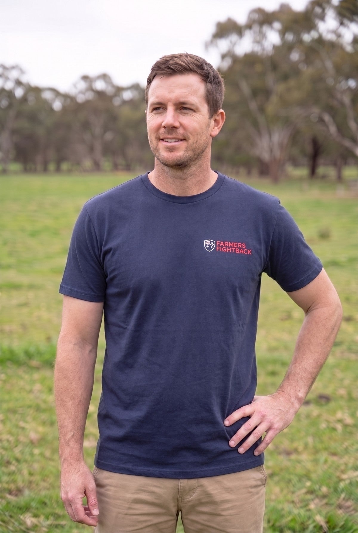Navy tee, mens fit, worn in an Australian paddock