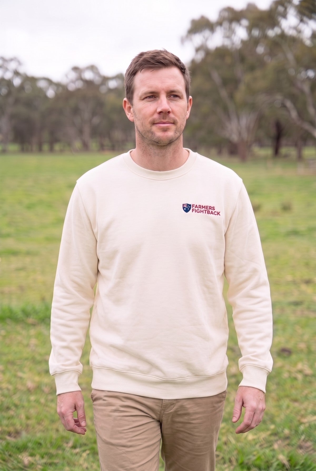 Ecru crew, mens fit, worn in an Australian paddock