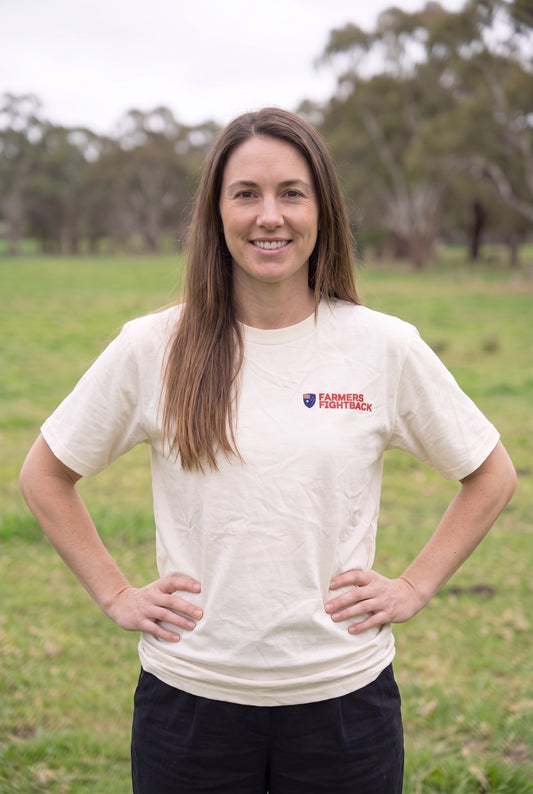 Cream tee, womens fit, worn in an Australian paddock