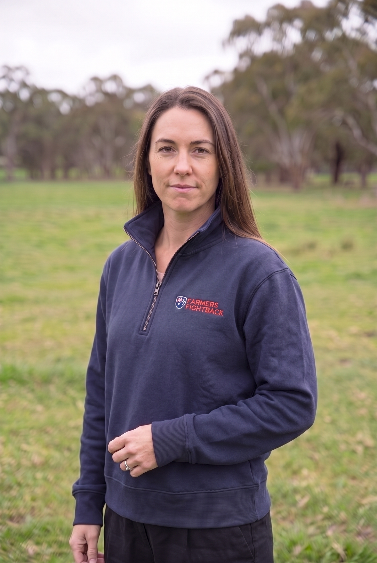 Navy quarter zip, womens fit, worn in an Australian paddock