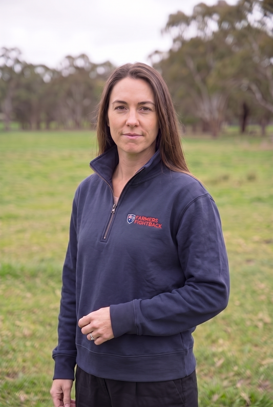 Navy quarter zip, womens fit, worn in an Australian paddock