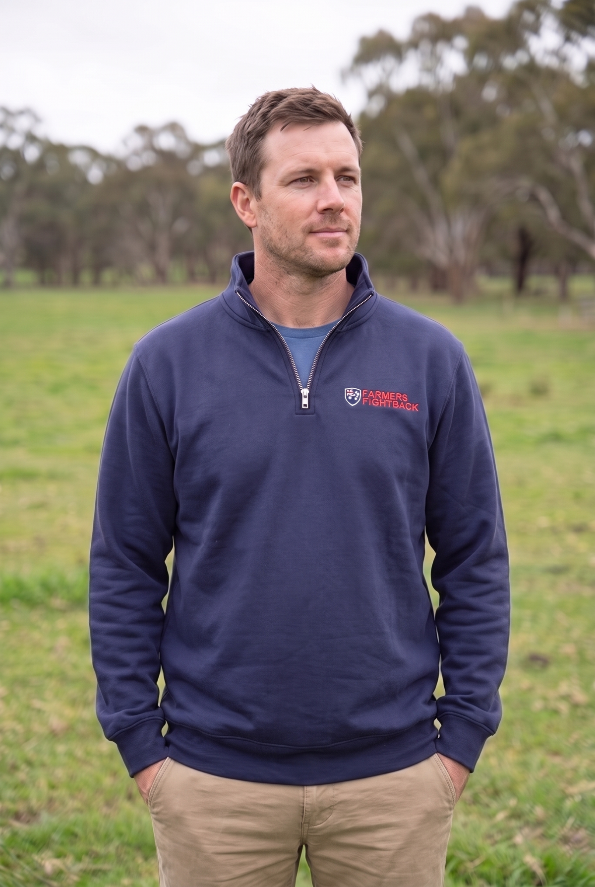 Navy quarter zip, mens fit, worn in an Australian paddock